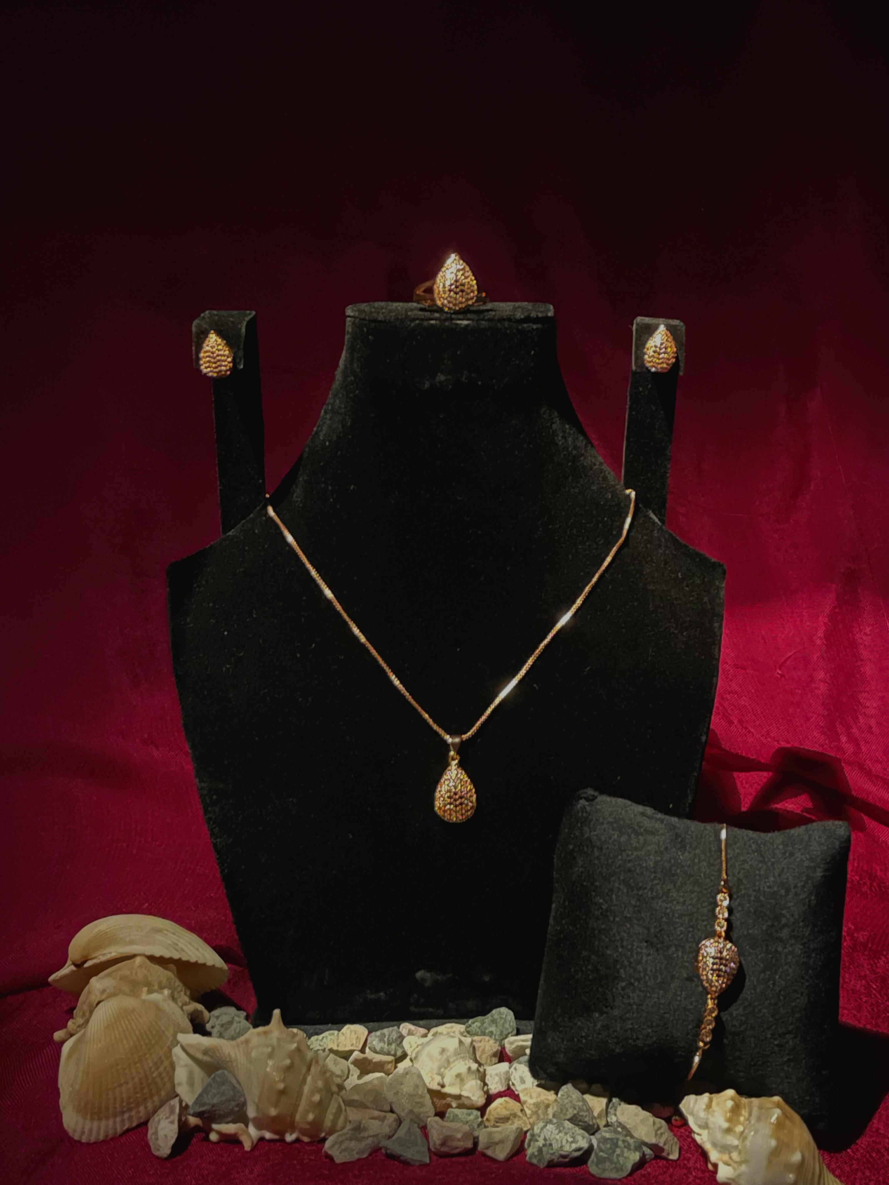 Golden Teardrop Elegance Jewelry Set (Necklace, Earrings, Bracelet & Ring)