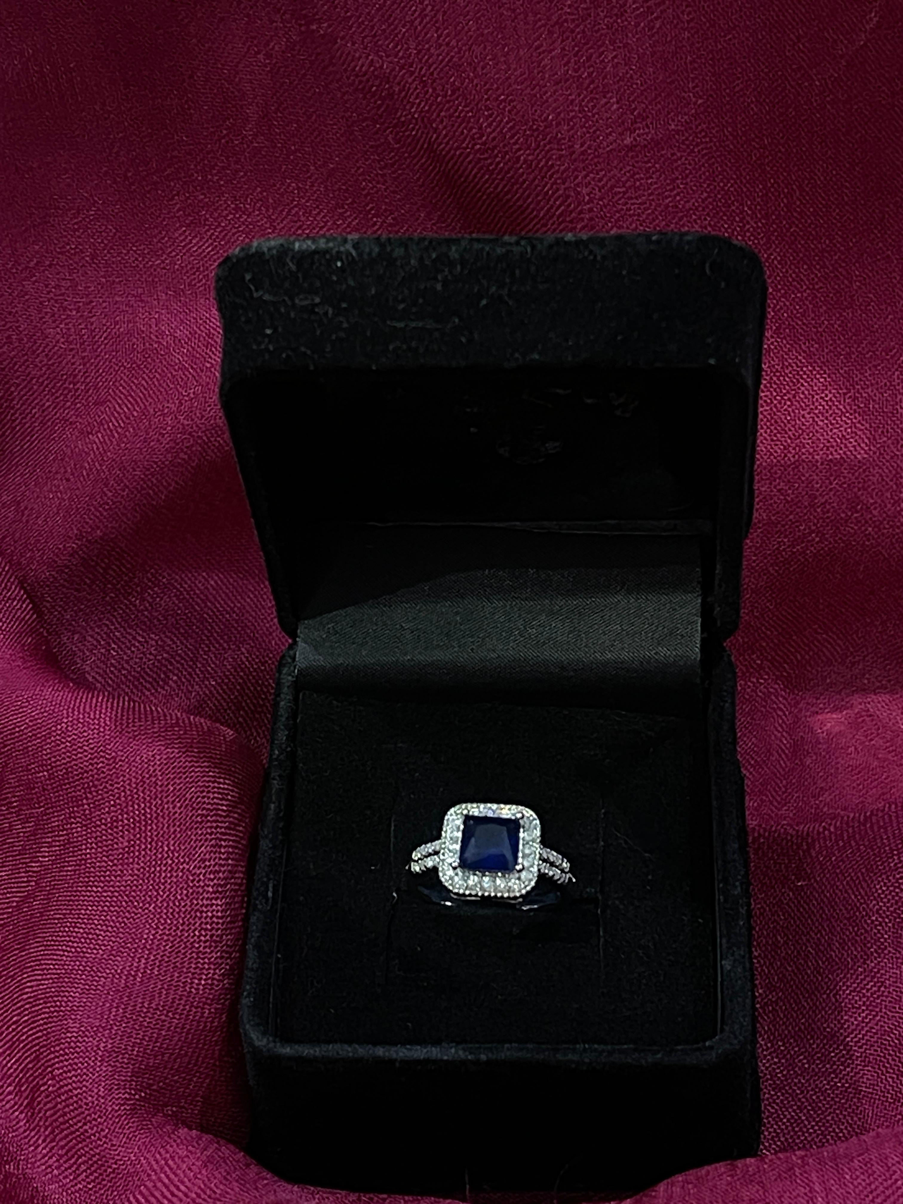 Emerald Elegance Halo Ring