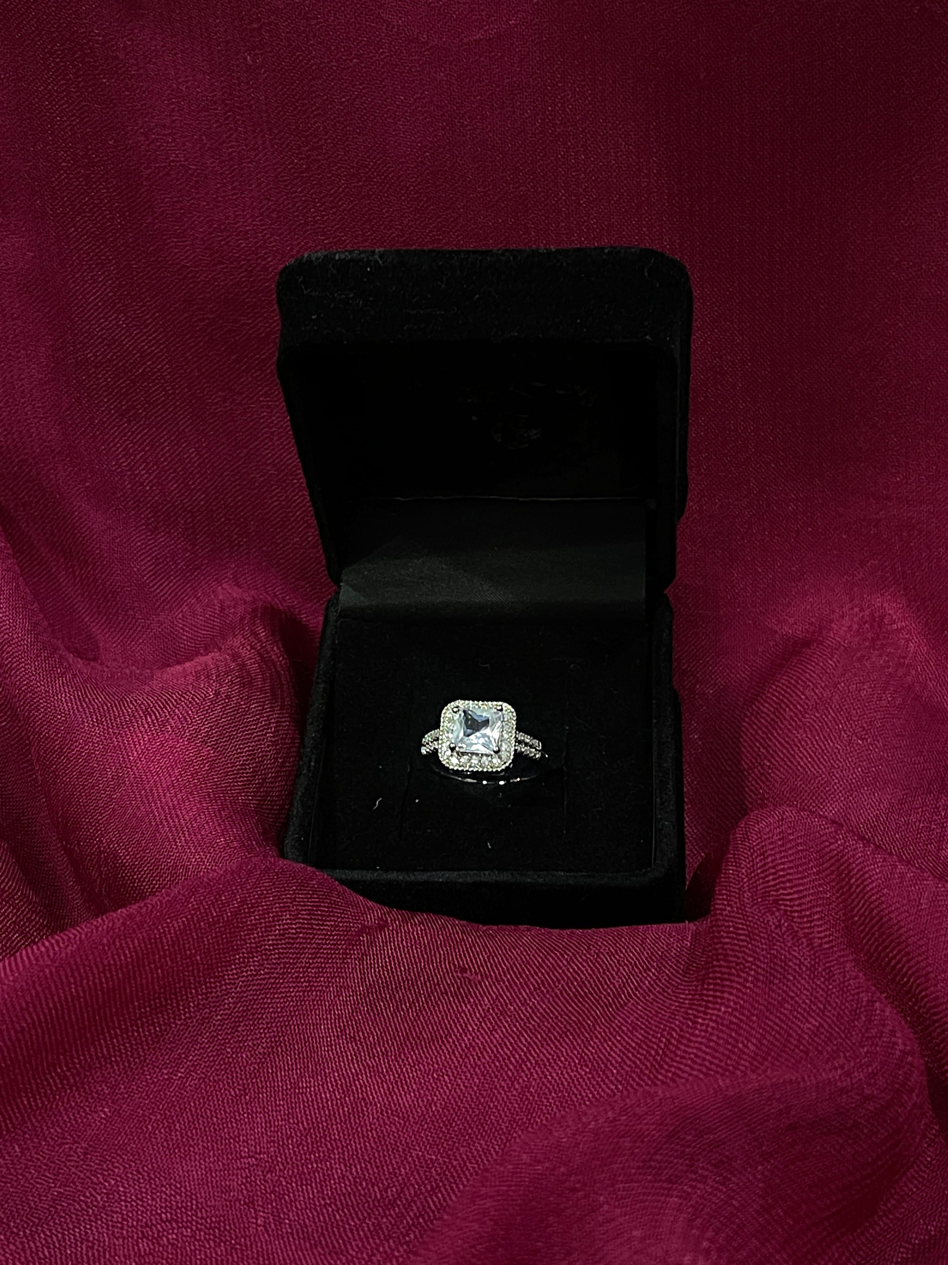 Emerald Elegance Halo Ring